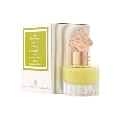 Hadiyyeh Ibraq Cardamom Musk hair mist in a clear glass bottle with a decorative gold cap next to its white box.